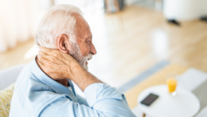 older man with neck pain